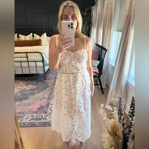Beautiful white lace dress perfect for a wedding shower or white party!